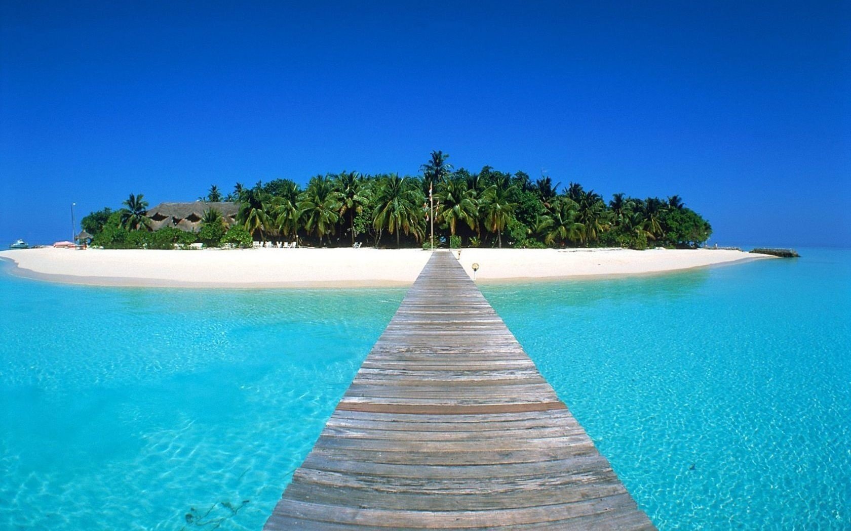 holzbrücke strand häuser wasser himmel inseln küste paradies azurblau türkis ozean tropen