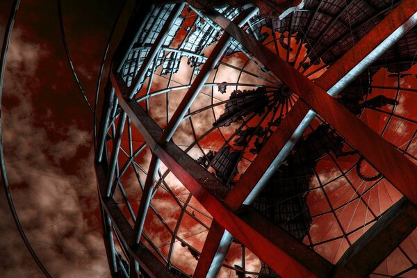 Layout eines Planeten aus einem Raster auf einem Hintergrund roter Wolken