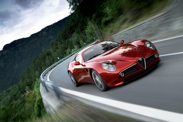 Roter alfa Romeo 8c auf Bergstraße Hintergrund