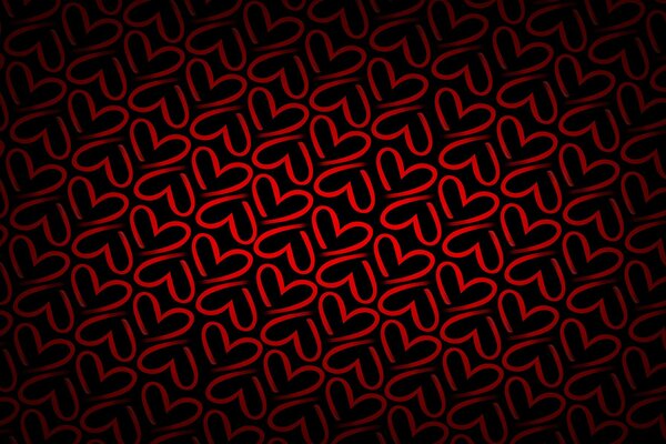 Textur mit roten Herzen auf dunklem Hintergrund