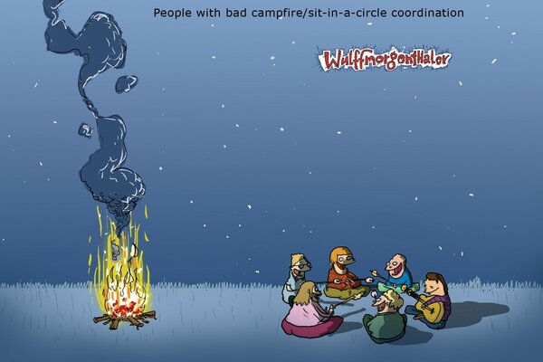 Picknick in der Nacht am warmen Lagerfeuer