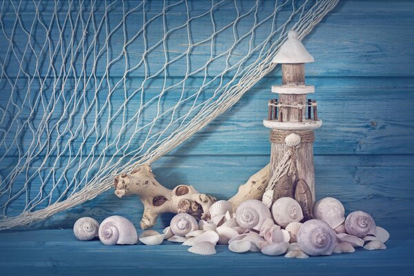 Handwerk zum Thema Meer aus Muscheln und Netzen