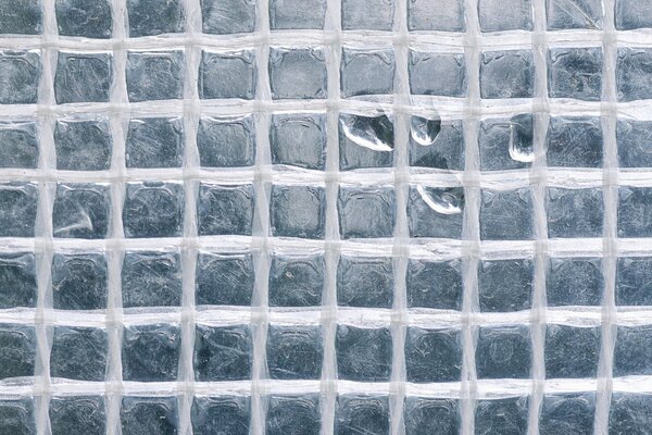 Wassertropfen auf einer quadratischen Textur