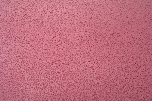 Schöne Textur rosa Hintergrund mit Tropfen