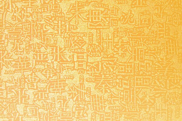 Goldene gelbe texturierte Hieroglyphen