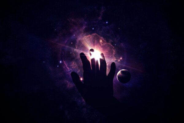 Die Hand, die das kosmische Licht bedeckt