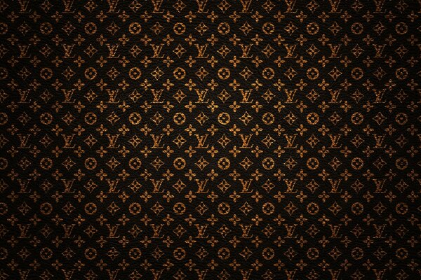 Luxus-Tasche. Goldene Verzierung auf braunem Hintergrund