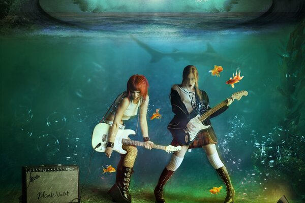 Konzert von Mädchen mit Gitarren unter Wasser