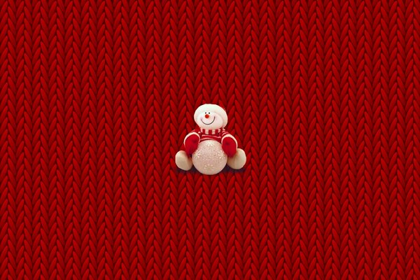 Schneemann im Neujahrs-Pullover
